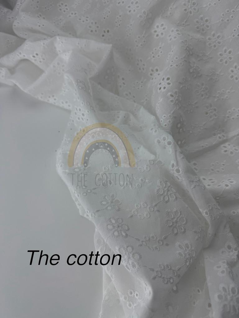 Батист вишивка - Вишивка набивна однотон квіти перфорація на молочному 024