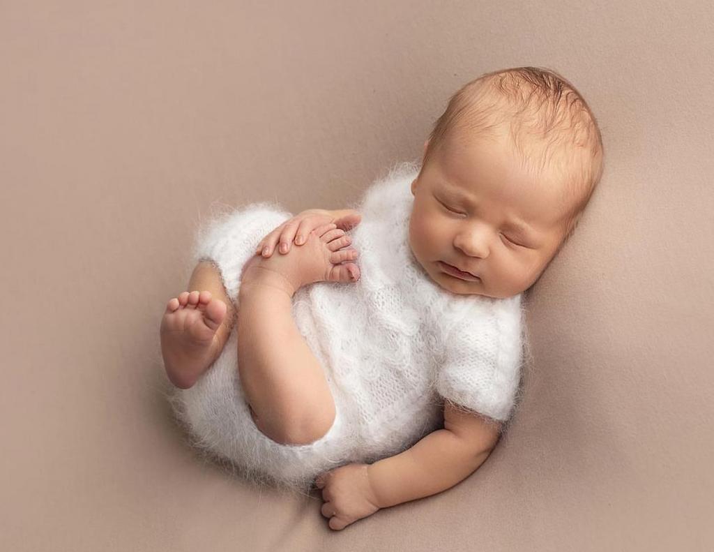 Overalls with braids, short legs, short sleeves and 3 buttons