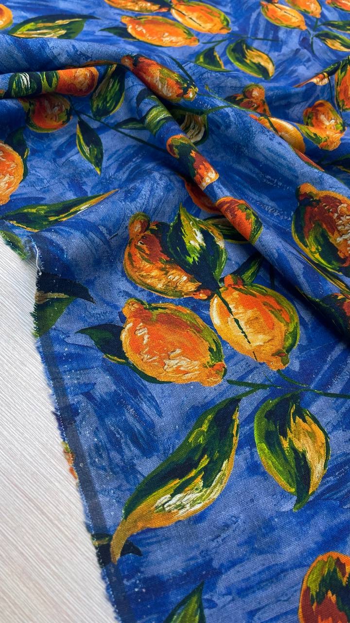 Лён костюмно-плательный фон синий с принтом оранжевые лимоны