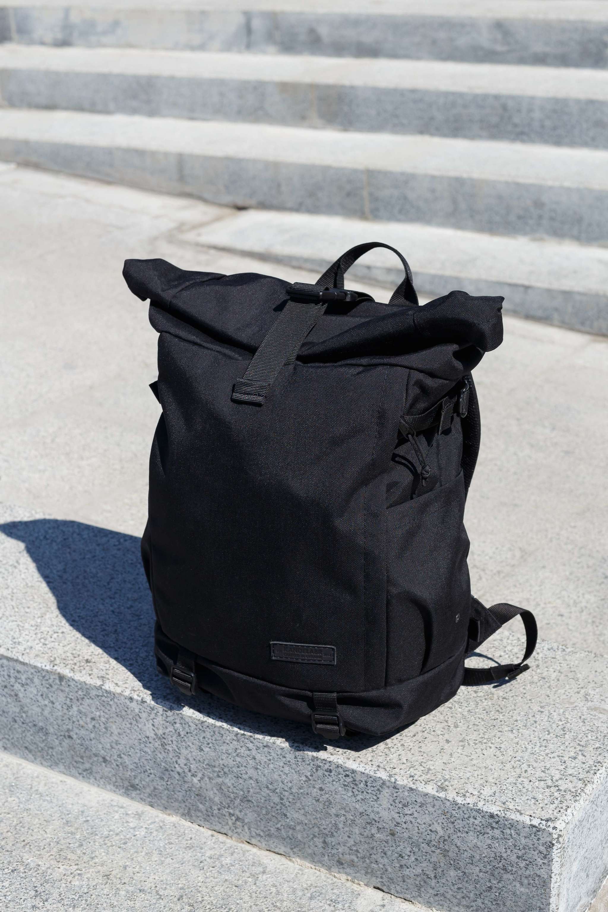 Crumpler roll top clearance backpack