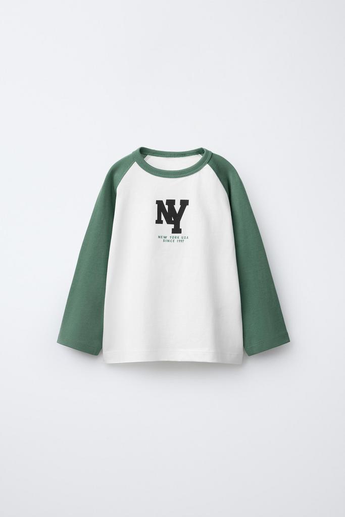 Контрастний лонгслів з принтом