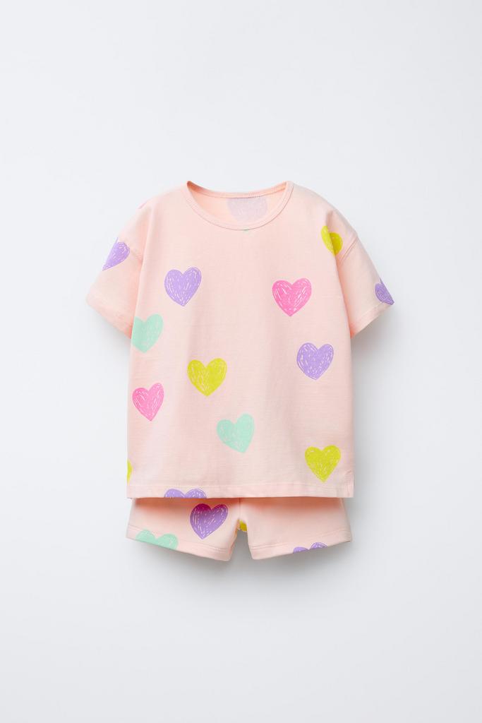 Комплект-двійка футболка з принтом і шорти Персиковий