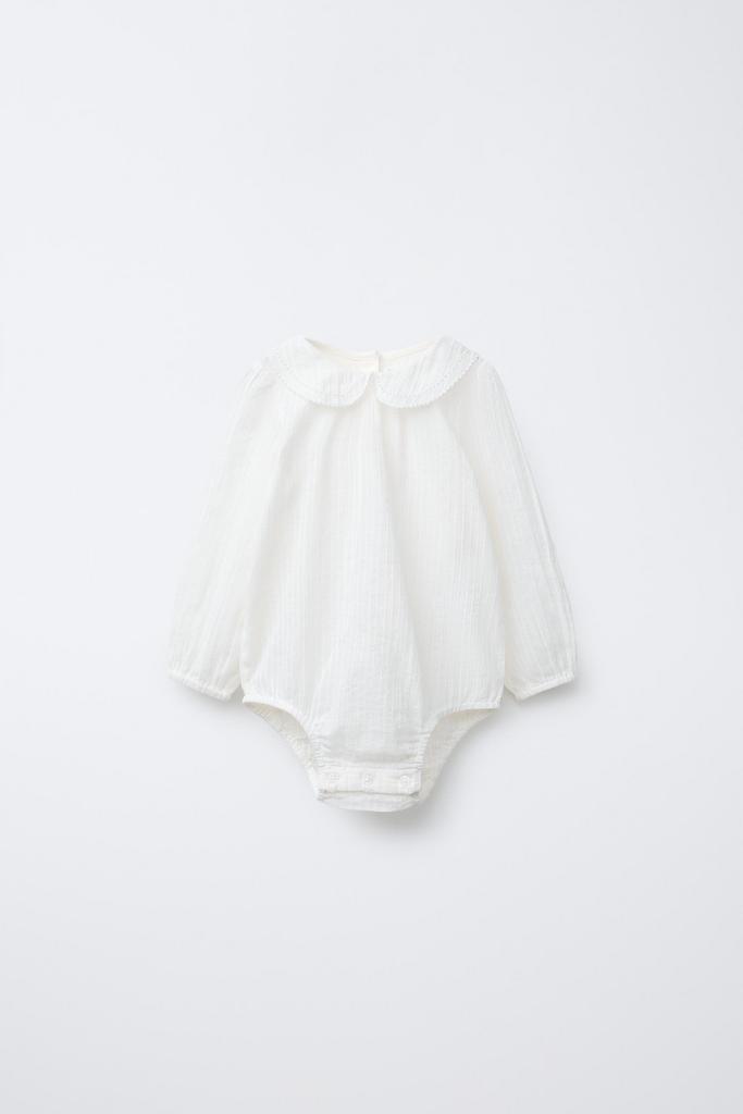 Текстуроване боді з мережкою на комірі