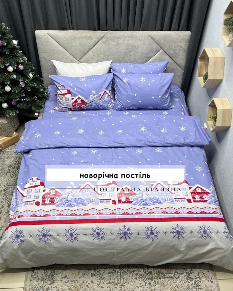 новогоднее постельное белье синего цвета со снежинками и домиками