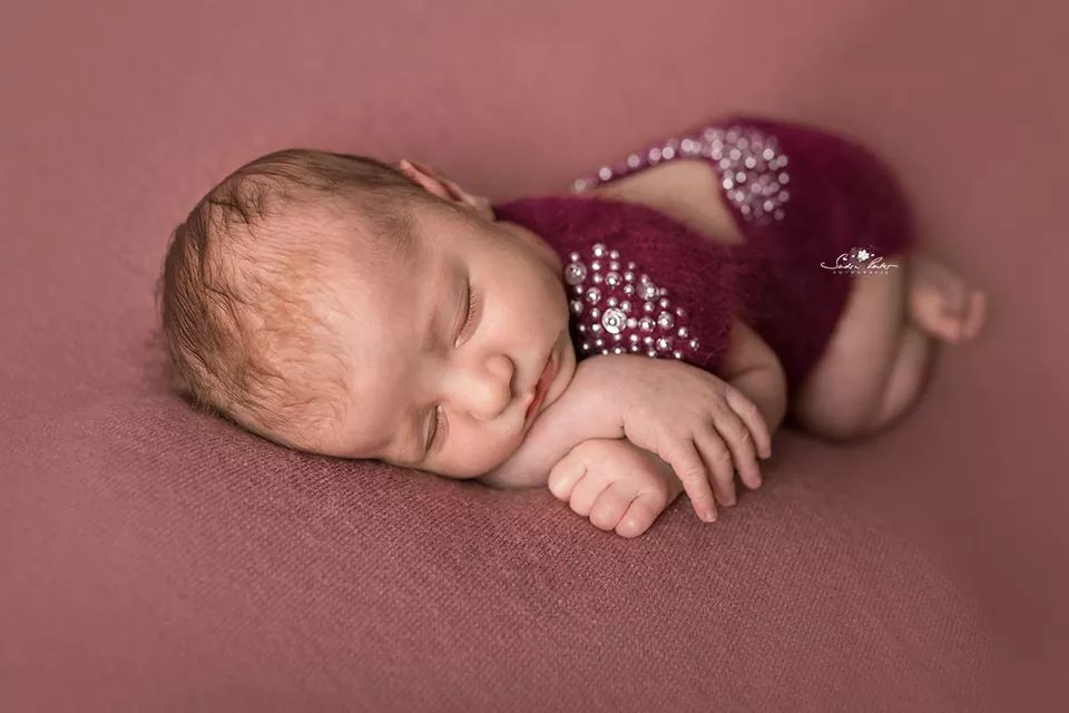 Body with drop neckline and pearls