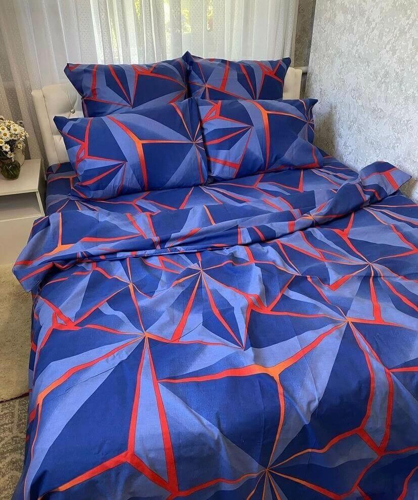 синее геометрическое постельное белье с красными линиями фото 1