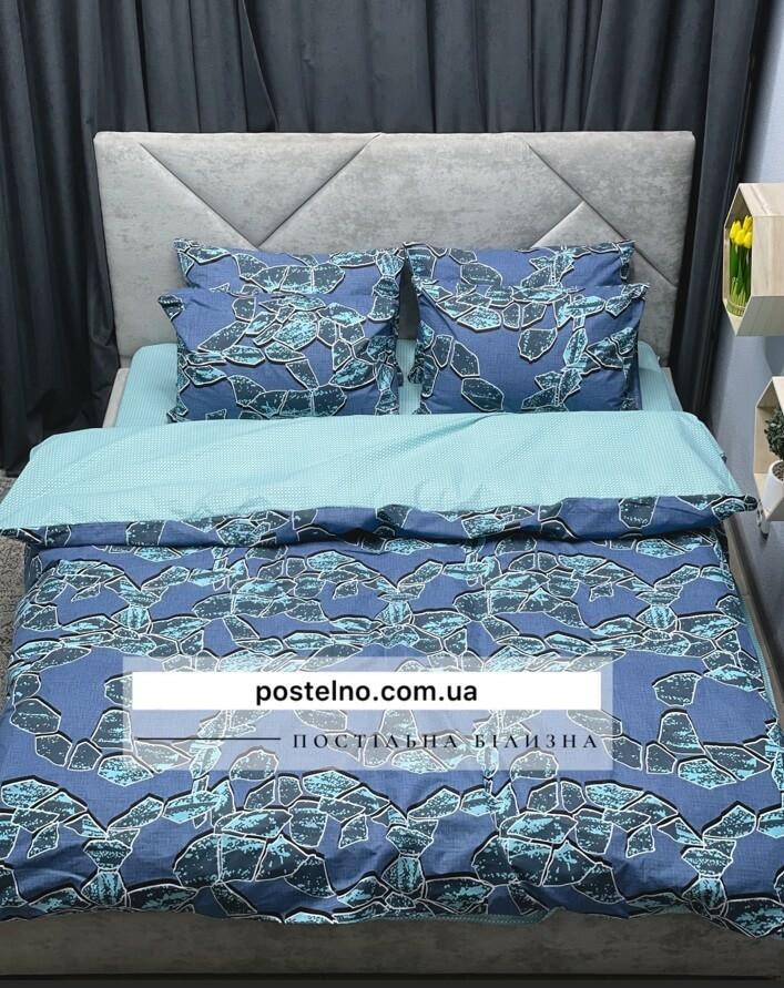постельное белье синего цвета с камушками