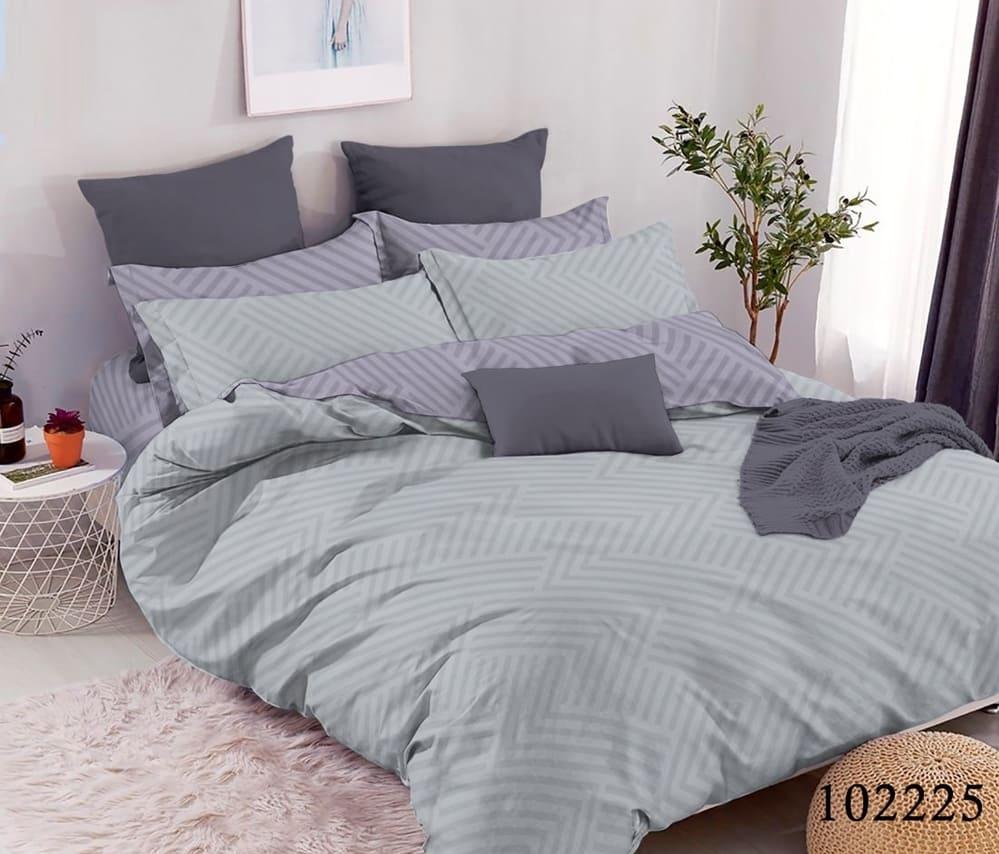 постельное белье светлого серого цвета с геометрическим рисунком