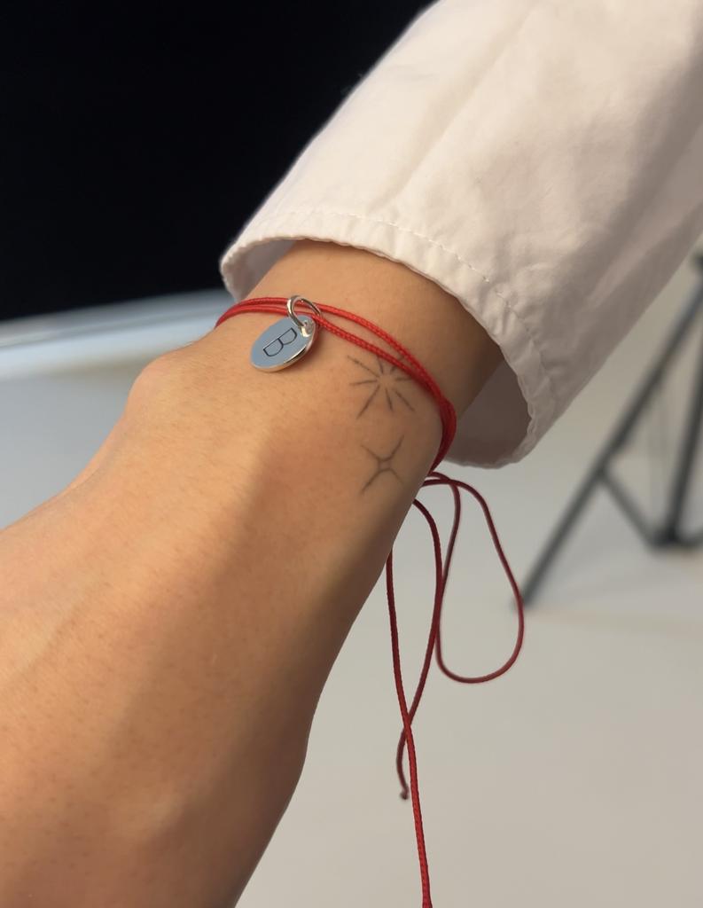 Монетка з ініціалом