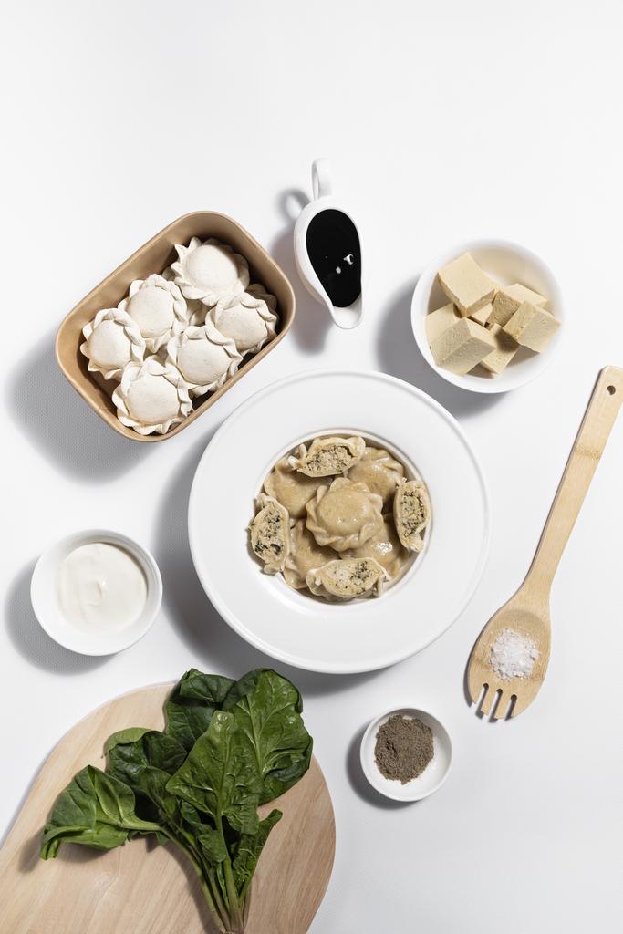 Безглютенові вареники з сиром тофу та шпінатом, кропом (солоні)