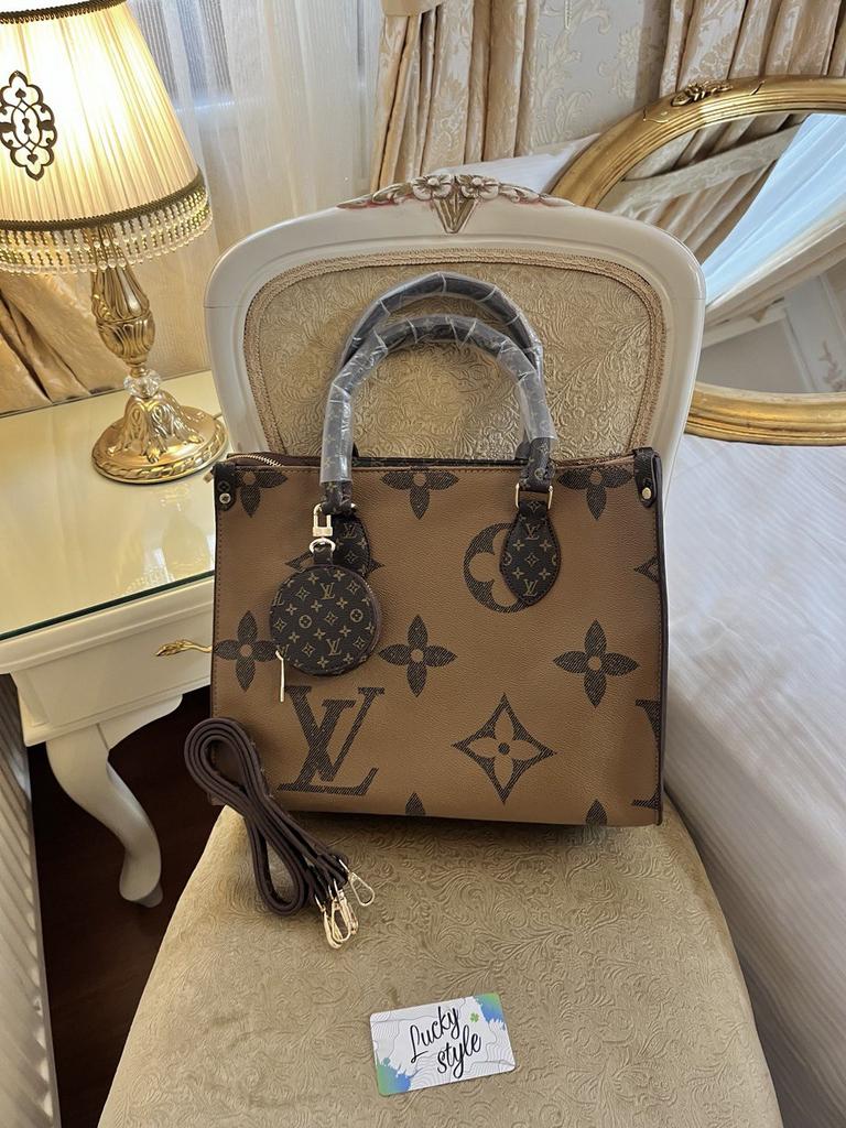 Сумка Onthengo MM латте на замке Louis Vuitton 879696
