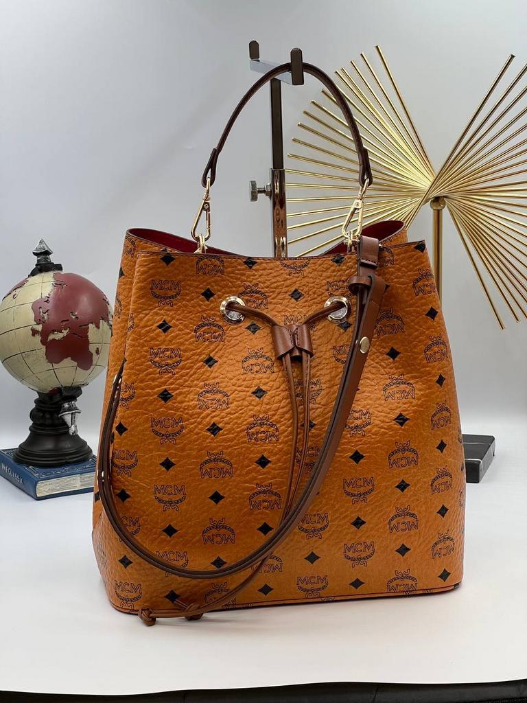 MCM сумка ведро натуральная кожа рыжая 523165124