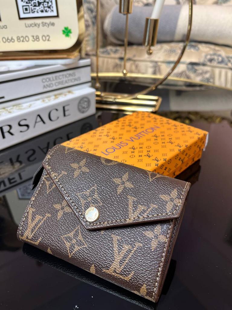 Кошелек Zoe Louis Vuitton с коричневой вставкой 4237751